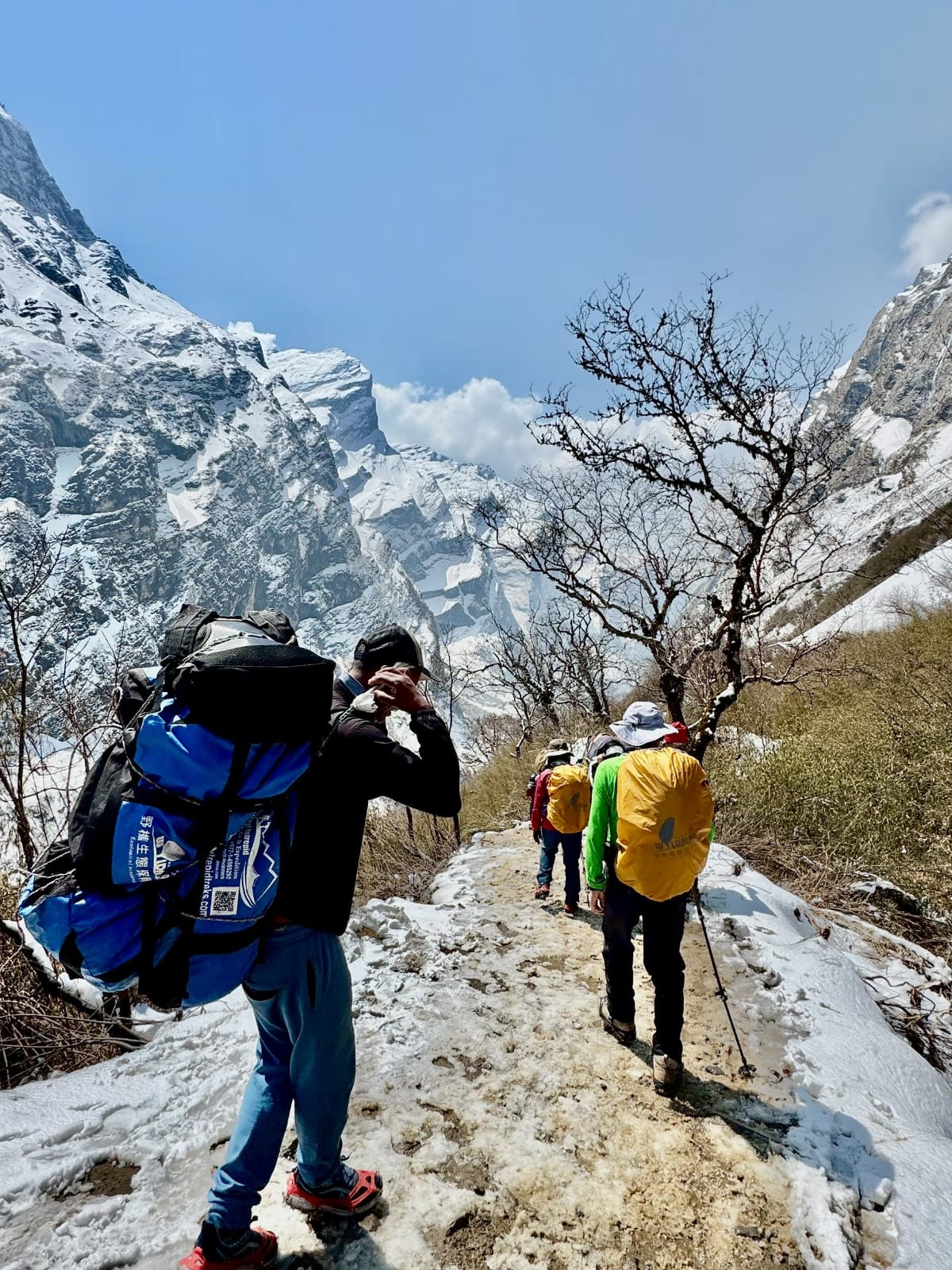 Walking on the ice by using Crampons on boots.
